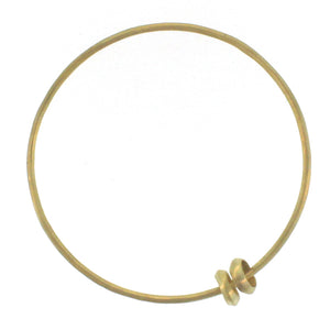 A 2mm Bangle with a Pair of Floating Beads