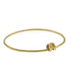 A 2mm Bangle with a Pair of Floating Beads