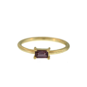 A Prong Set Purple Sapphire Ring