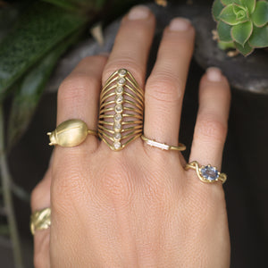 A Blue Sapphire Ribbon Ring