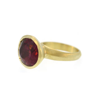 A Molded Oval Dark Pink Tourmaline Ring